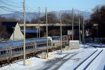 Amtrak #20(2) faces north in the early morning sun of January 4.  5th St. bridge, Tobacco Row Mtn. and a snow-delayed NS intermodal in the background.